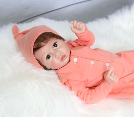 Apricot color swaddle set for a baby girl coming home outfit. Baby knot gown with matching baby hat. Available in Sz NB - 3 Mo. 294265 Il_570xn
