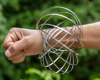 GloFX Flow Ring - Magic Kinetic Slinky Spring Interactive Kinetic Toy Music Festivals Flow Ring Raves Parties Concerts Costumes Light Shows