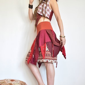 red and orange skirt with braids, forest elven clothing, tribal festival costume