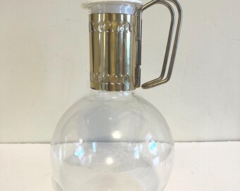 Mid Century Modern Glass + Brass Decanter with Bakelite top.