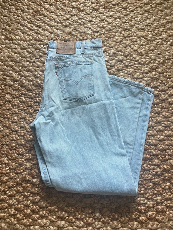 Vintage Levi’s 550 orange tag high waisted jeans