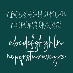 May include: A white handwritten alphabet in uppercase and lowercase letters on a teal background.