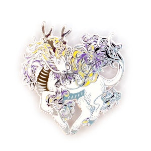 May include: A silver-toned enamel pin depicting a stylized dragon with yellow, purple, and white accents. The dragon is in a heart shape and has intricate details.