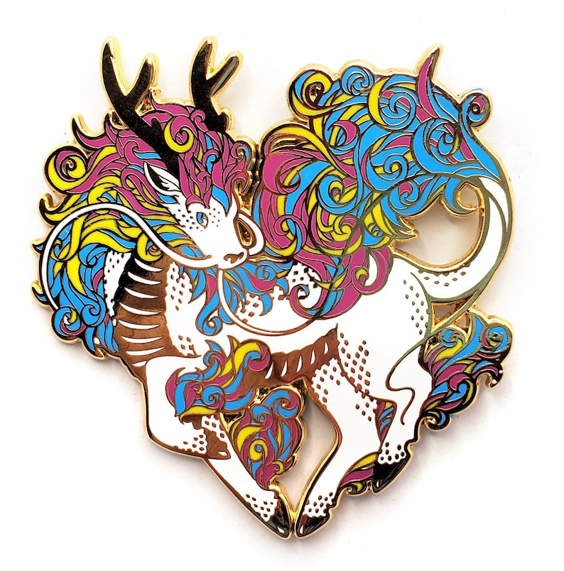 May include: Gold-tone enamel pin featuring a stylized white dragon with a pink, blue, and yellow mane. The dragon is depicted in a running pose with its tail curled around its body.