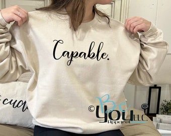 Capable. One Word Collection; express yourself sweatshirt; empowerment clothing; strength in style; inspirational apparel; affirmation