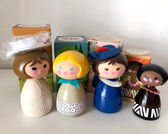 avon small world dolls