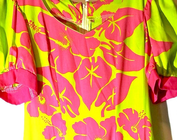 Yellow dress with pink ruffle