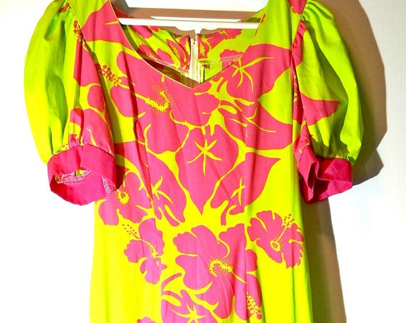 Yellow dress with pink ruffle