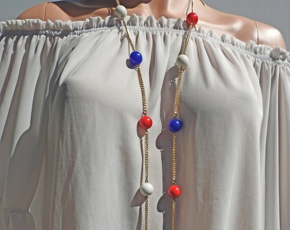 Very long red white and blue bead necklace