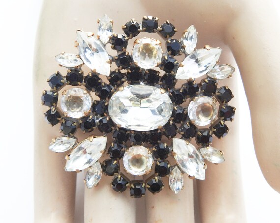 White black brooch