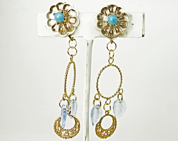 clip on earrings with blue leaves