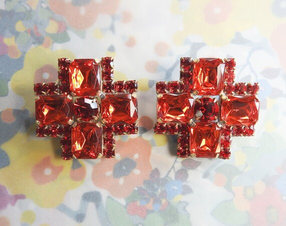 Cross-shaped buttons