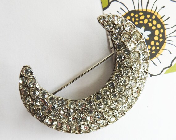 Crescent moon brooch