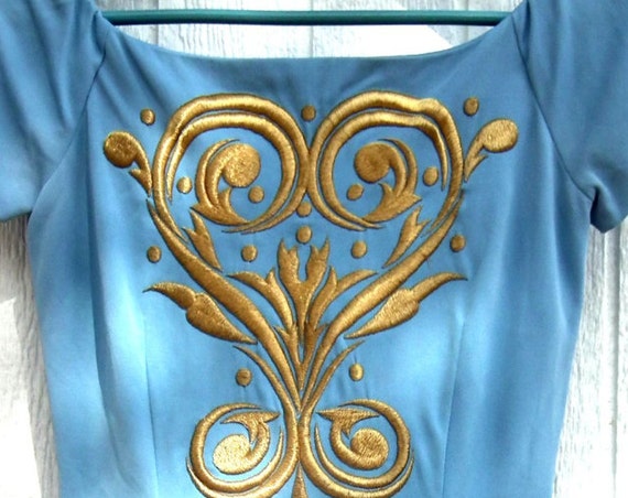 Vintage dress for woman with embroidery.