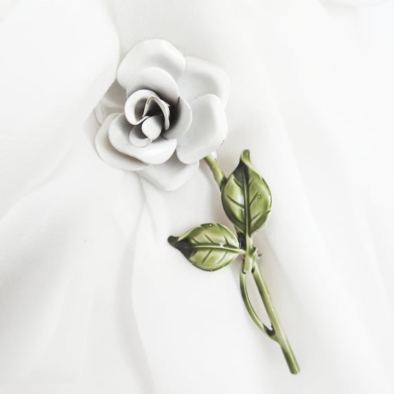 White rose brooch