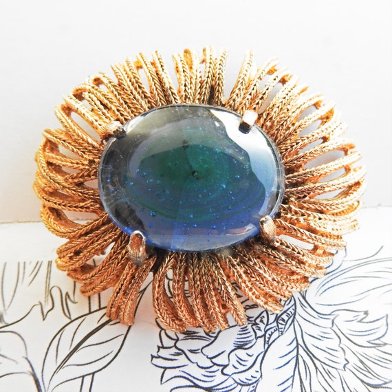Blue rhinestone brooch