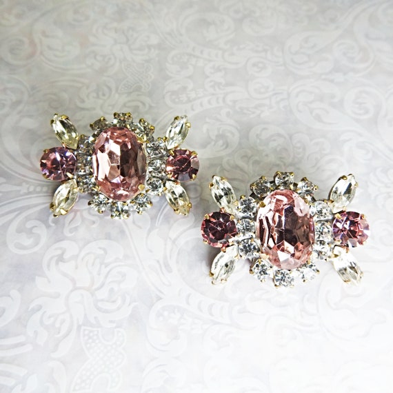 Pair of pink glass buttons