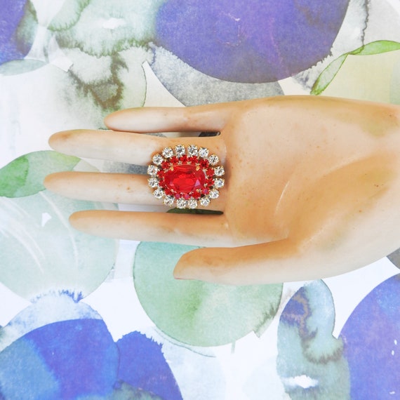 Red oval button