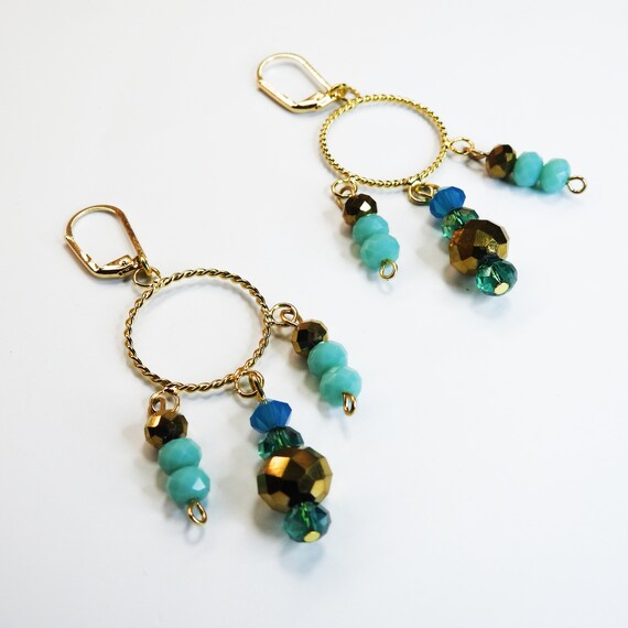 Dangly hoop earrings with beads blue