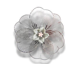 Oversized 40 mm flower button with silver petals, grey and pink floral center, shank back. Lightweight and perfect for sewing or crafts