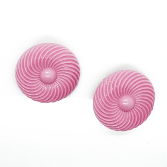 large round clip on earrings with fun neon pink color!