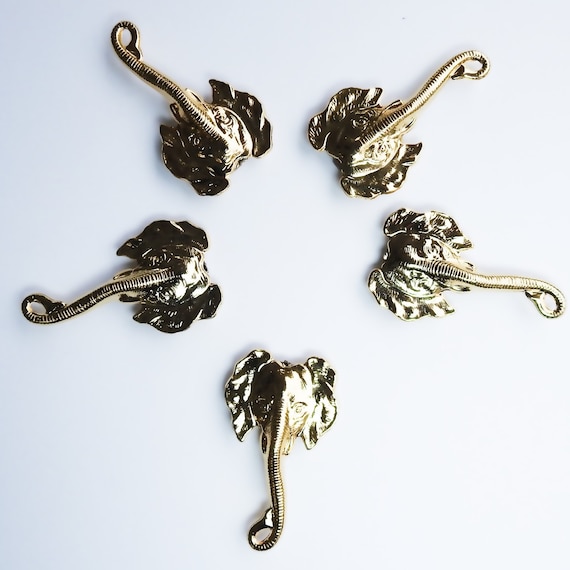 Vintage button covers, elephant gifts for women, buttons with elephants on them, animal buttons for photo frames, and home decor.