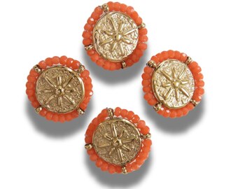 Set of 4 gold-toned 18mm fancy buttons for decorating. Roman medallion-inspired design, rosette motif, surrounded by orange glass seed beads