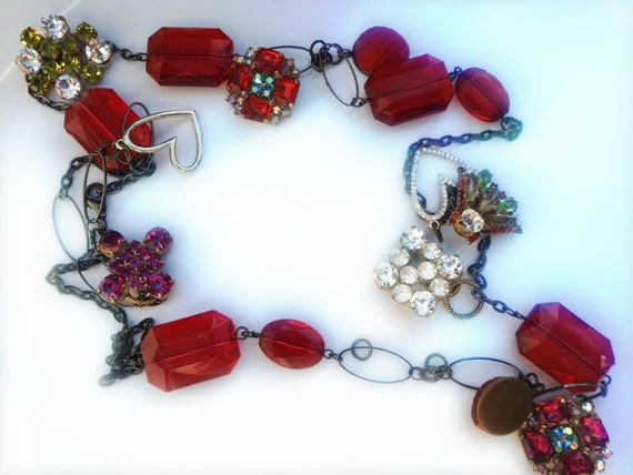 Unique Red upcycled jewelry statement necklace with strawberry and heart.