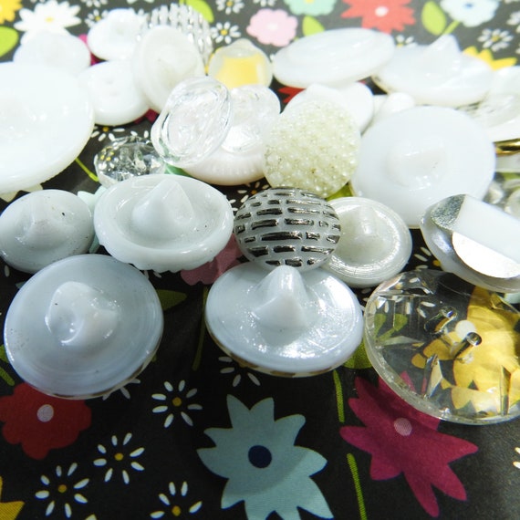 Mixed lot of old white and clear buttons