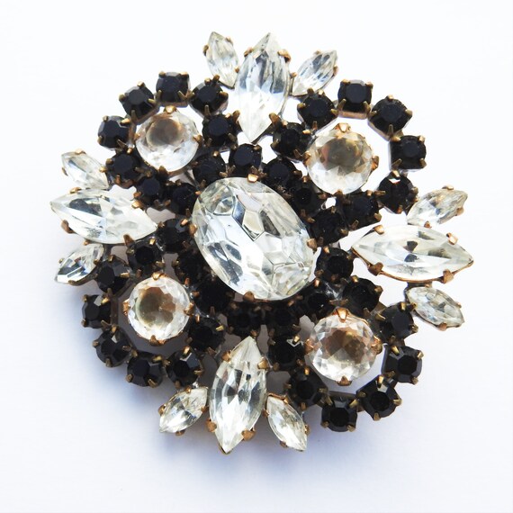 White black brooch