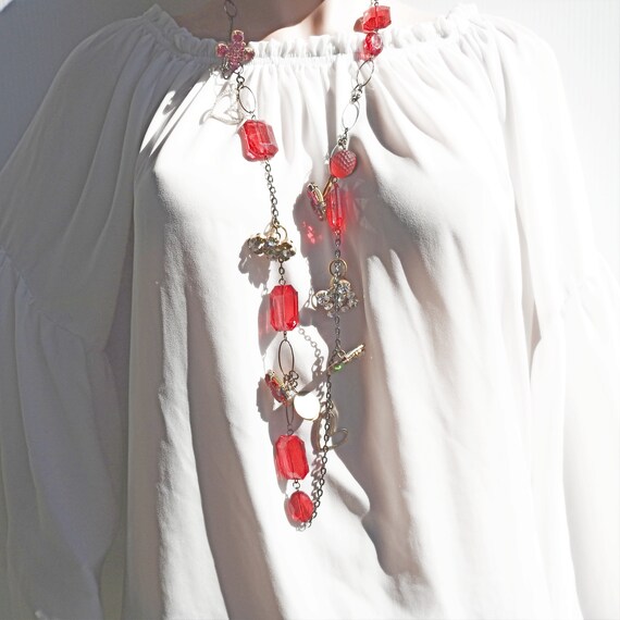 Unique Red upcycled jewelry statement necklace with strawberry and heart.