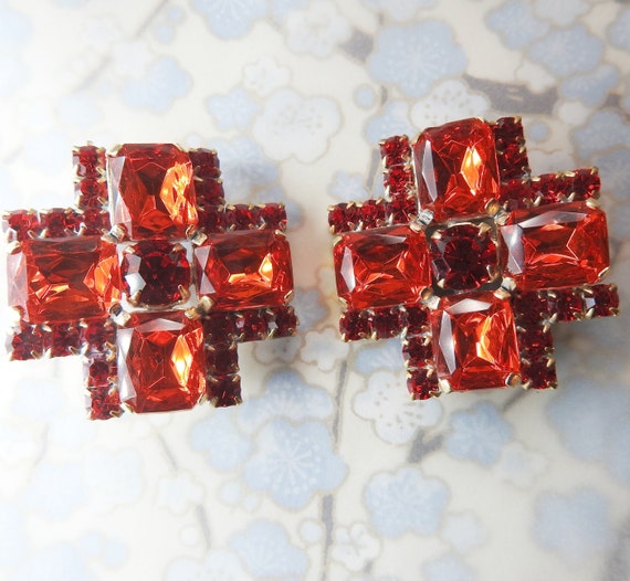 Cross-shaped buttons