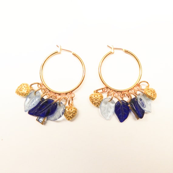 Blue hoop earrings with charms