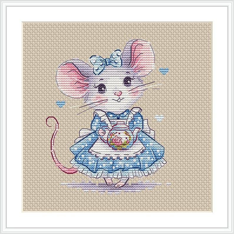 May include: A cross-stitch embroidery pattern on beige Aida cloth featuring a white mouse with pink ears, wearing a blue polka-dot dress with a white apron and a blue bow. The mouse holds a small floral teapot, surrounded by light blue heart icons.
