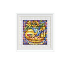 May include: A cross-stitch pattern featuring a yellow teapot, a pie, and a bouquet of sunflowers in a blue vase. The background is a colorful geometric pattern.