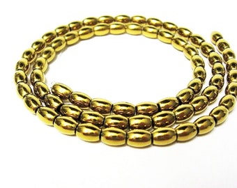 Hematite olive 8 x 5 mm gold plated strand, chain strand