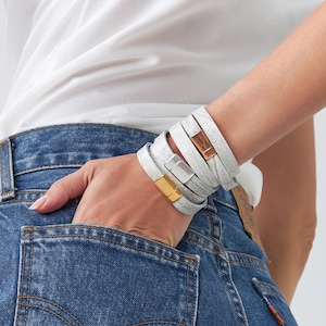 Set of three wrap bracelets beautifully handcrafted from top quality leather. The boho bracelets for women feature minimalist magnetic clasps that come 24k gold, rose gold and silver plated. A stylish accessory for any season.