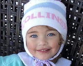 Pom Pom Ear Flap Hat with stripes Name and bows Be sure to let me know all colors