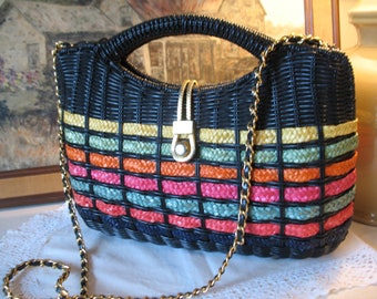 Plastic wicker handbag with vintage shoulder strap chain Black color and color strip.