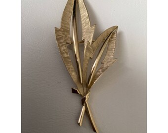 classy brooch