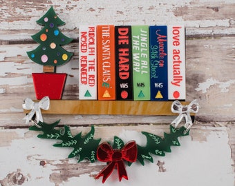 Christmas movie vhs shelf brooch, Shelfie brooch, Xmas movie jewellery, acrylic pin badge, Christmas acrylic brooch