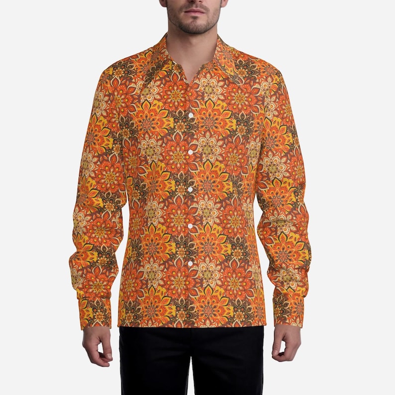 May include: A long-sleeved button-down shirt with a colorful floral pattern in shades of orange, brown, and yellow.
