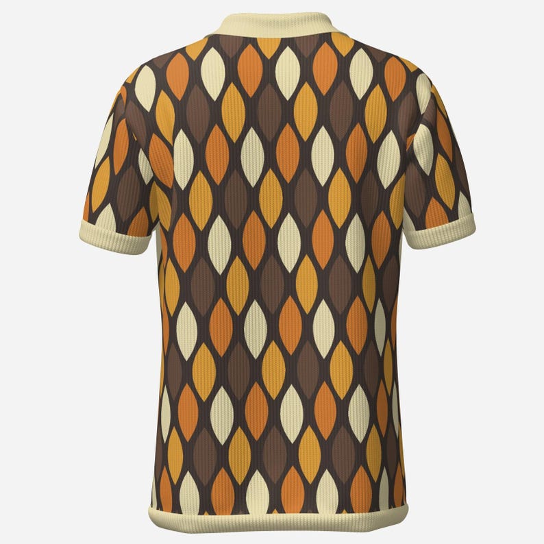 May include: A short-sleeved polo shirt with a retro pattern. The shirt features a repeating design of elongated, leaf-like shapes in shades of brown, orange, and cream. The collar and sleeve cuffs are a solid cream color.