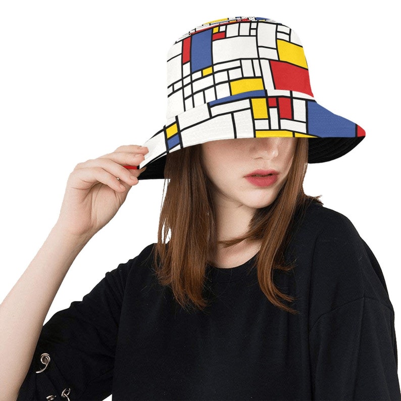 1960s Men’s Hats History, Styles, Trends     Bucket Hat Mod Hat 60s style hat Unisex Hat Mondrian Print Hat Geometric Hat Red Blue Hat Vintage style hat  AT vintagedancer.com