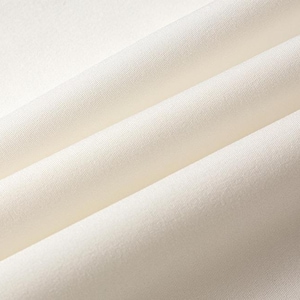 May include: Close-up of a smooth, white fabric with soft folds and wrinkles.