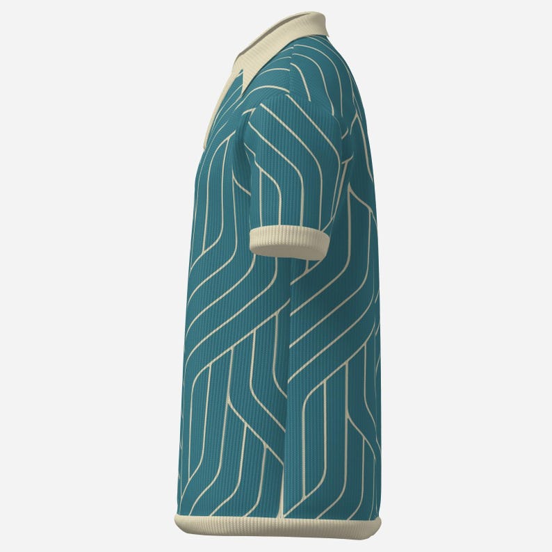 May include: Teal polo shirt with a cream-colored collar, cuffs, and hem. The shirt features a white, wavy, vertical stripe pattern. The short-sleeved shirt is made of a ribbed fabric.