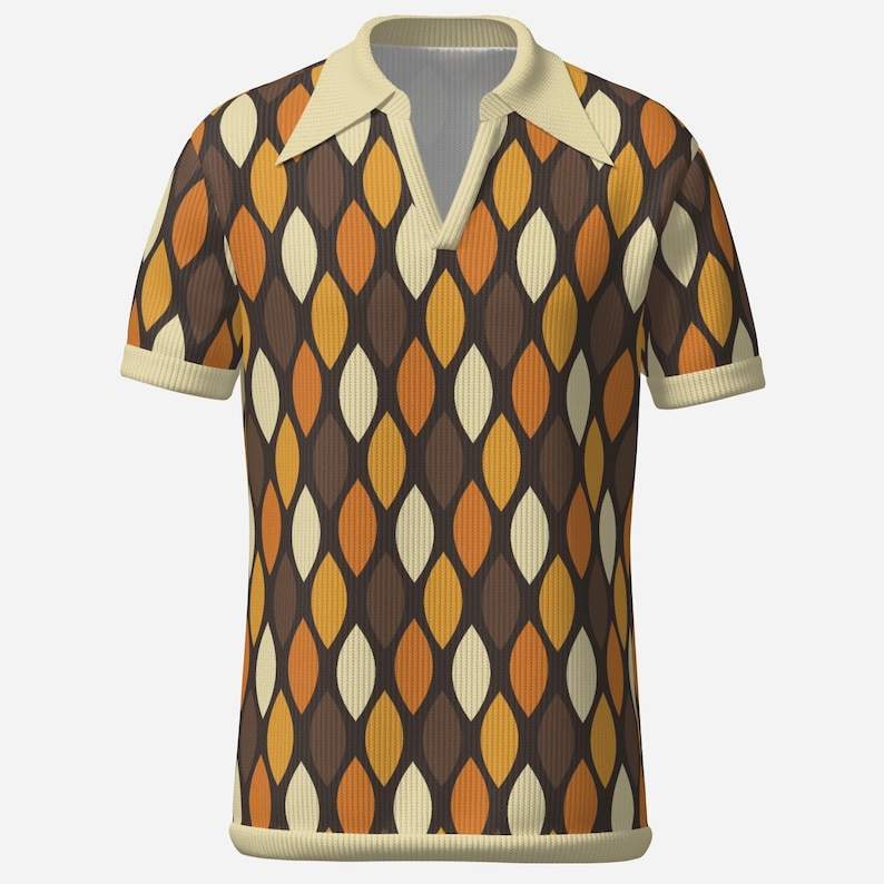 May include: A short-sleeved polo shirt with a retro design. The shirt features a V-neck collar and a pattern of brown, orange, and cream-colored leaf shapes. The collar and sleeve cuffs are a solid cream color.