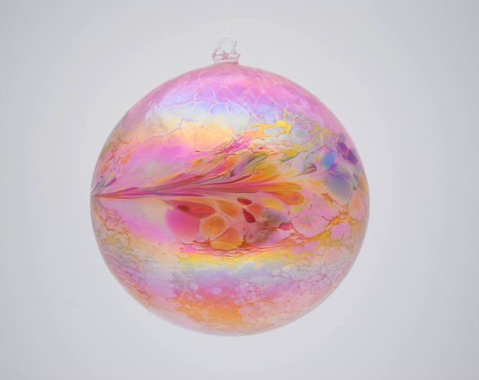 e00-62 Iridescent Ornament Pink with colorful chips melted on top