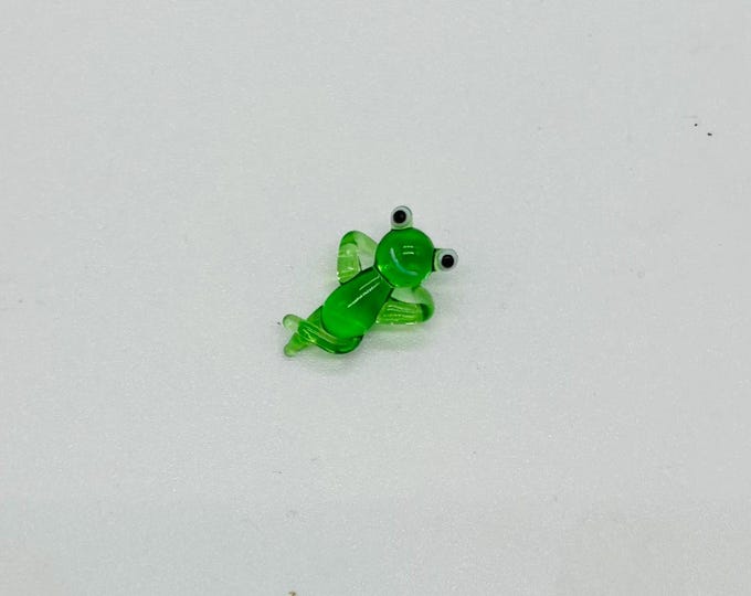 e30-00 Miniature lounging Frog