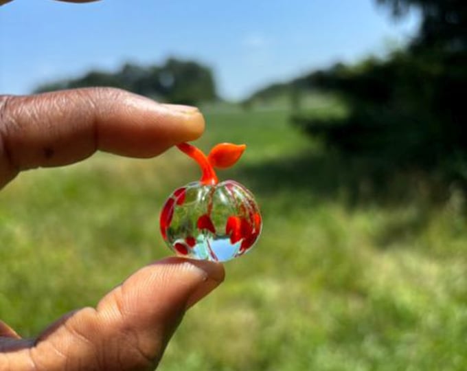 e30-00 Miniature Clear Pumpkin with Speckles and Orange Stem